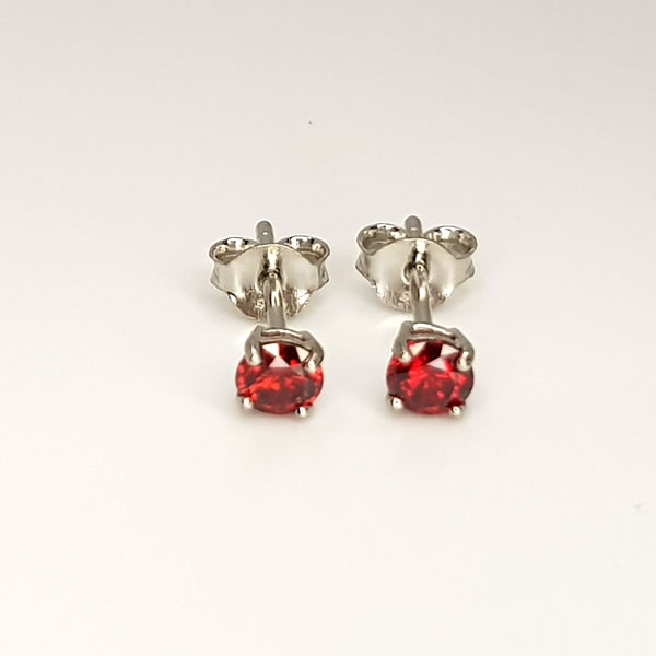 Release your creative energy with this stunning bright red garnet stud earrings. This January birth stone is a symbol of Love, friendship, light and vitality.